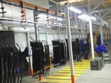 Electrophoresis coating suspension conveying system for automobile structural parts
