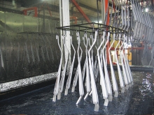 Electrophoresis coating line for rain cover