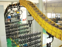 Electrophoretic coating line for flexible lifting chain of shock absorber parts