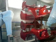 Bilateral side-mounted bumper robot spraying line