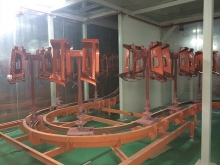 Ground rail vertical chain conveyor