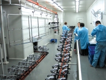 Rearview mirror suspended pre-treatment line to ground rail conveyor system