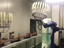 Robot handling system for door handle pre-processing line to spraying line