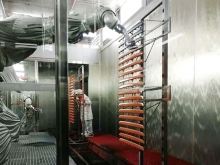 Internal and external decorative strip robot spraying skid conveyor line